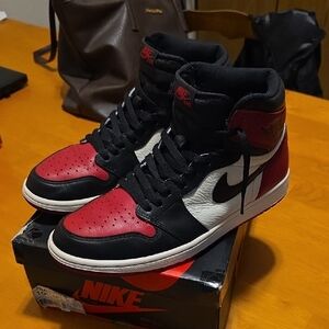 Nike Black and Red Sneakers Iconic Design